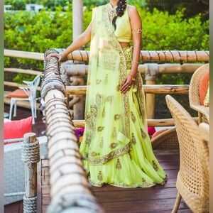 Designer Lime Green Net Lehenga with Raw Silk Halter Blouse